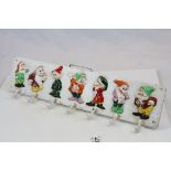 Painted cast iron "seven dwarfs" coat hanger