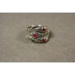 Silver snake ring with tourmaline cabochons