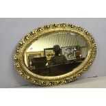 Carved Giltwood Oval Wall Mirror with Bevelled Edge, 110cms x 80cms