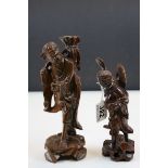 Two carved Oriental Hardwood figures, tallest example approx 22cm in height