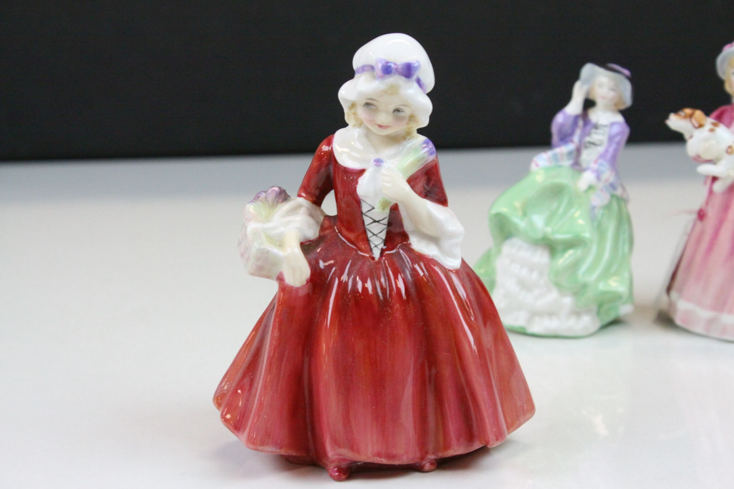 Four Royal Doulton ceramic figurines to include; Lavinia HN1955, Top O' the Hill HN3499, My First - Image 4 of 9