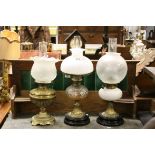 Three Antique Oil Lamps to include Shades and Chimneys