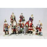 Hamilton Collection set of eight figures from the "International Santa" collection, accented with