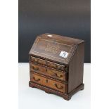 Apprentice piece Oak Bureau with Brass fittings and inlaid initials "C.C" to front, measures