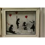 Framed artwork of girls with red balloons