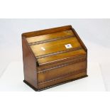 Varnished Oak Stationary box with hinged slide away lid, measures approx 35 x 28 x 16cm