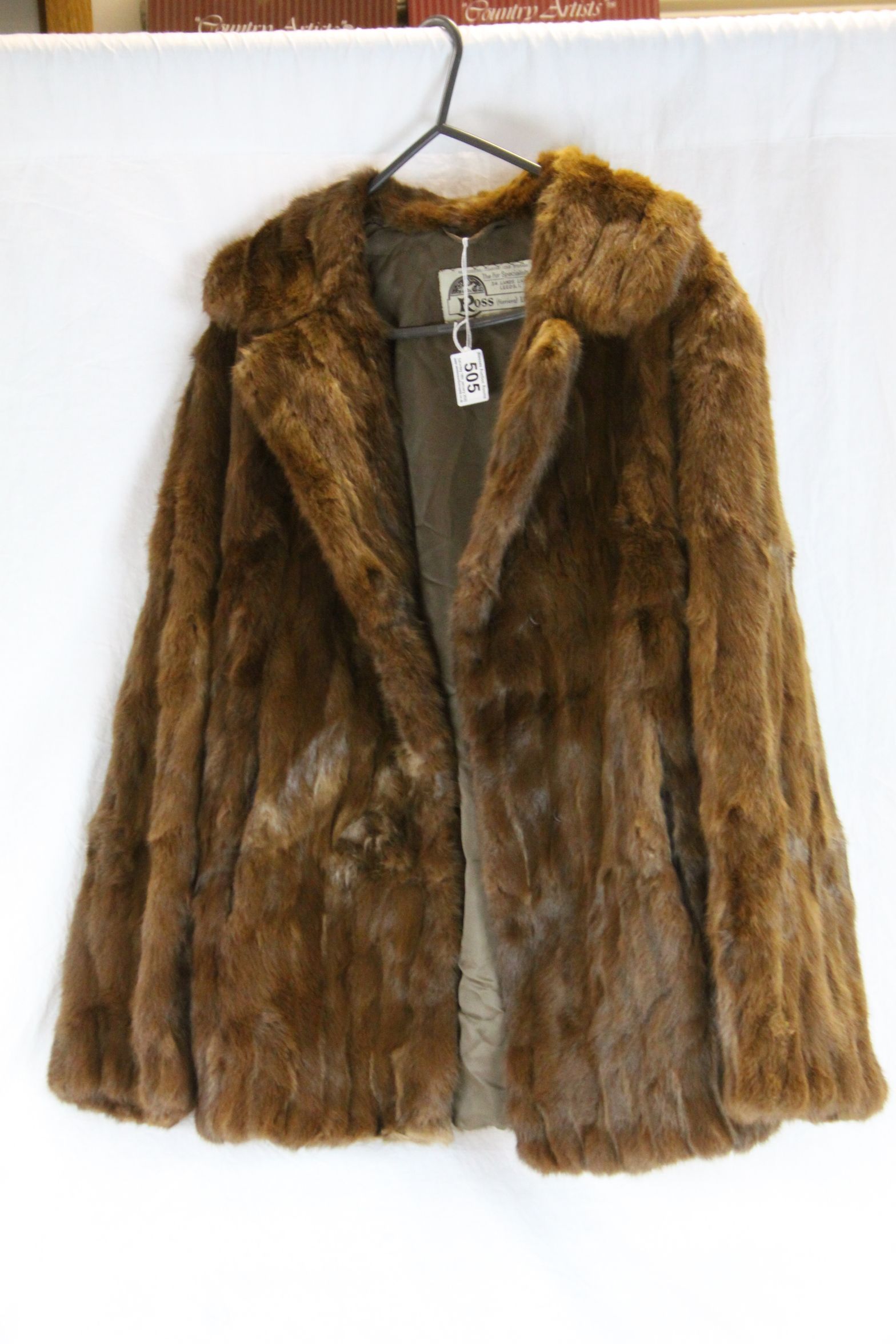 Vintage red squirrel fur coat with Ross Furriers of Leeds label, hook and eye fastenings, two