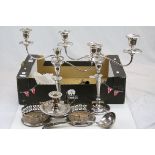 Pair of good quality silver plated three branch candlesticks, pair of silver plated bottle stands,