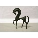 Bronze figure of a stylised horse with etched decoration