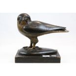 Vintage carved wooden sculpture of a falcon bird of prey