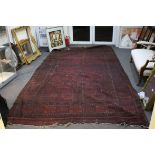 Large Eastern Wool Red Ground Rug, approx.420cms x 210cms wide