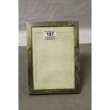 Hallmarked Silver photograph Frame with wooden stand back, takes Photographs approx 19 x 12.5cm