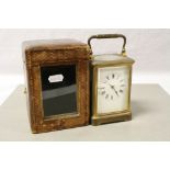 Brass & bevelled Glass Carriage Clock, key wind with striking movement marked "Made in Paris", comes