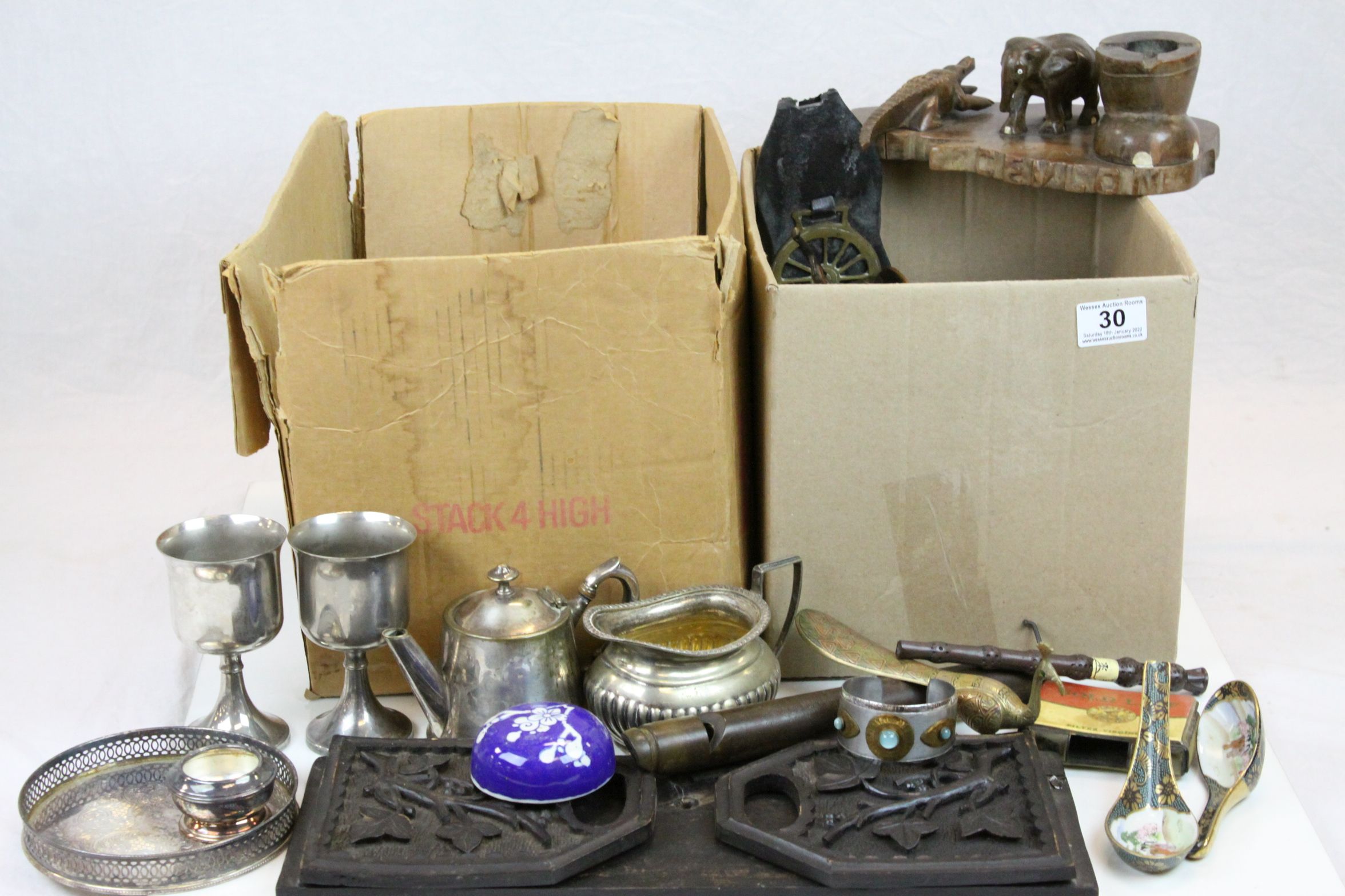 Two boxes of mixed collectibles to include silver plate, puzzle box, treen, ceramics etc