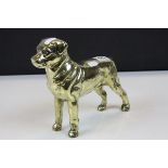 A brass model of a dog