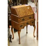 Early 20th century Queen Anne Style Walnut Bureau, the hinged drop front opening to reveal a