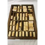 Brass detailed wooden Printer's Tray marked "Haddon London" with collection of used wine Corks, tray