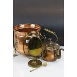 Copper coal scuttle raised on brass claw feet, a table top dinner gong & a 19th century copper