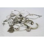 Collection of silver and white metal jewellery including rings, necklaces, Swarovski ring etc