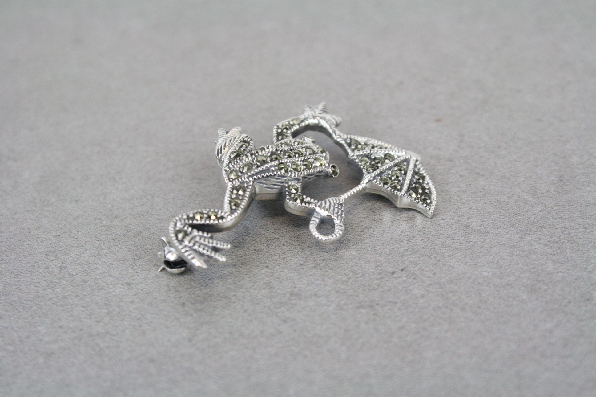 Silver and Marcasite lizard brooch with umbrella
