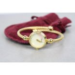 Ladies Gold plated Gucci quartz Wristwatch with Mother of Pearl dial & Burgundy velvet pouch,