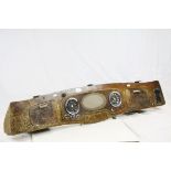 Vintage wooden car dash board with dials