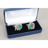 Pair of silver and jade dragon form cufflinks with ruby eyes