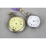 Hallmarked Silver Fob Watch with Floral painted decoration to the Enamel dial, comes with key and