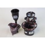 Four items of 19th century slag glass, to include top hat, jug & two vases