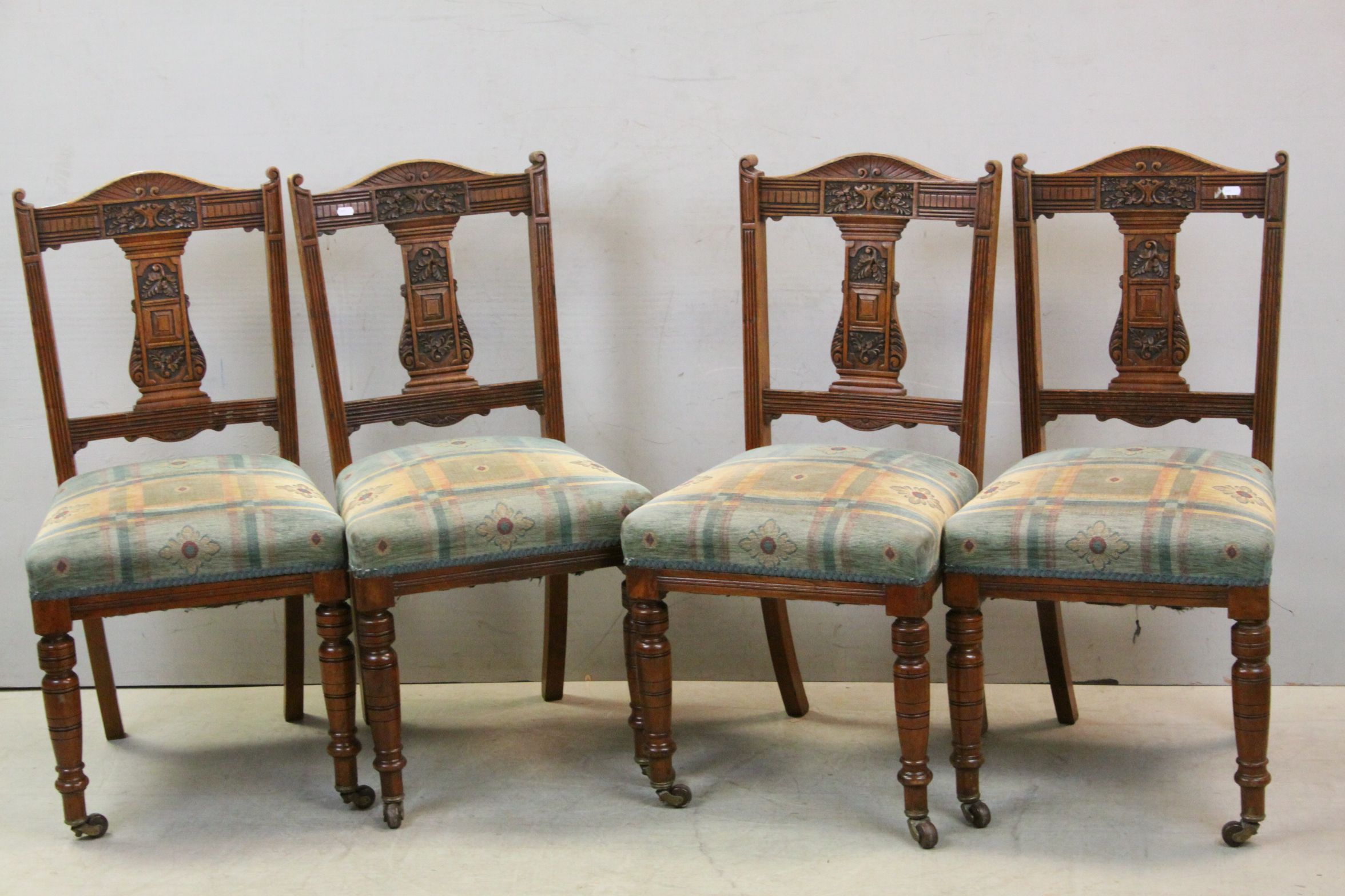 Set of Four Late Victorian / Edwardian Dining Chairs with carved back