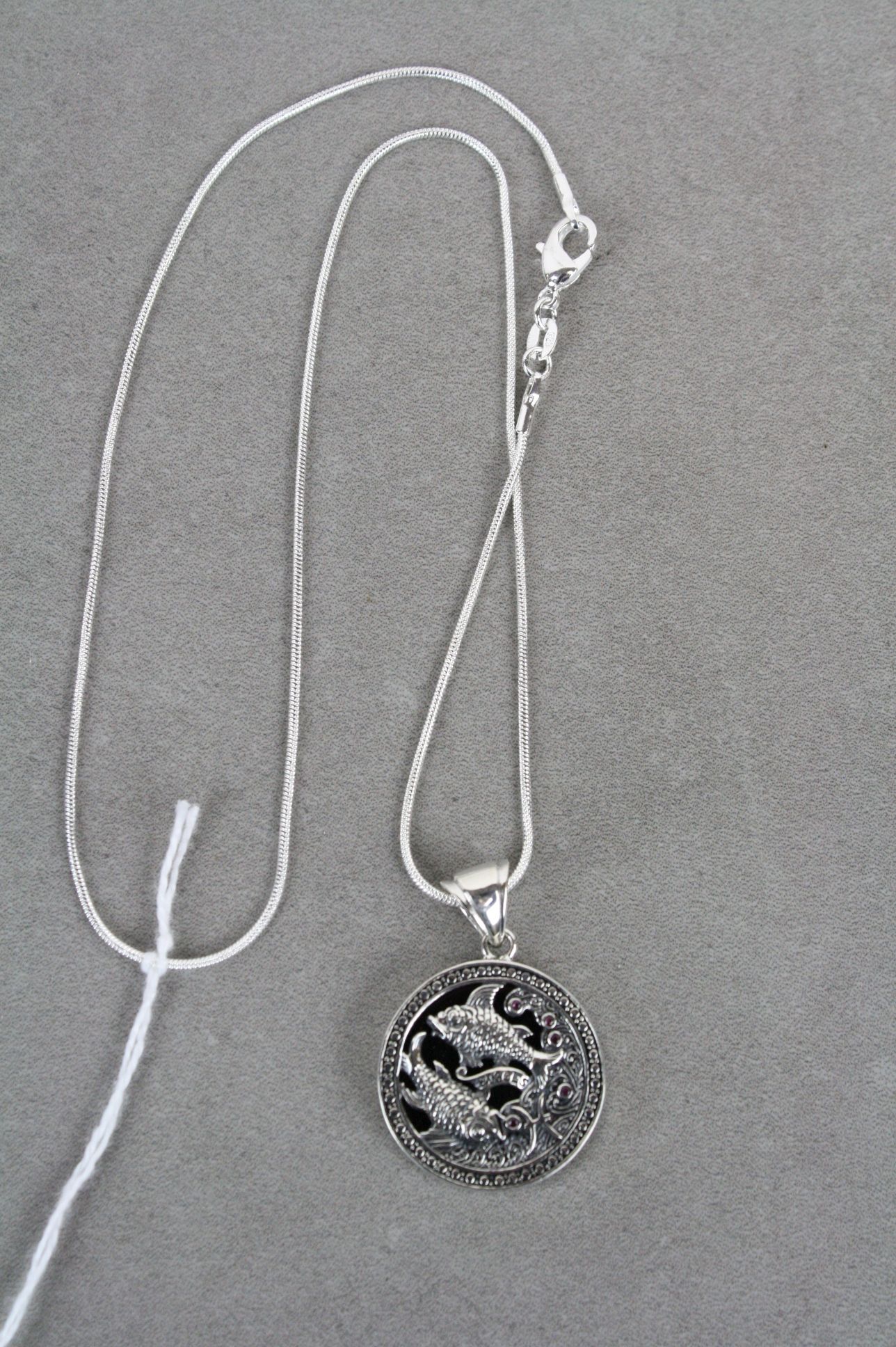 Silver and Onyx Pisces style pendant necklace