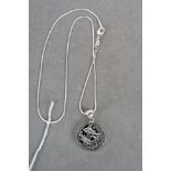 Silver and Onyx Pisces style pendant necklace