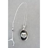 Silver pendant locket with owl decoration