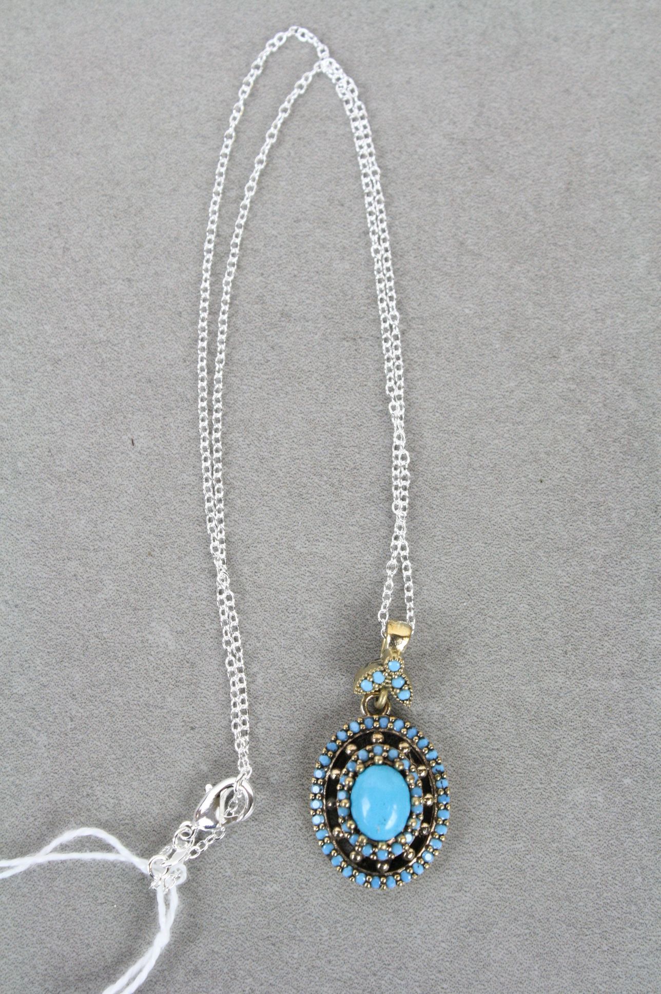 Silver and turquoise pendant necklace