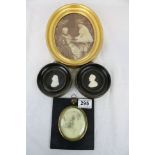 Two Victorian framed cameo profiles, framed late Victorian/Edwardian photograph and a photograph