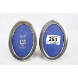 Pair of hallmarked silver oval picture frames