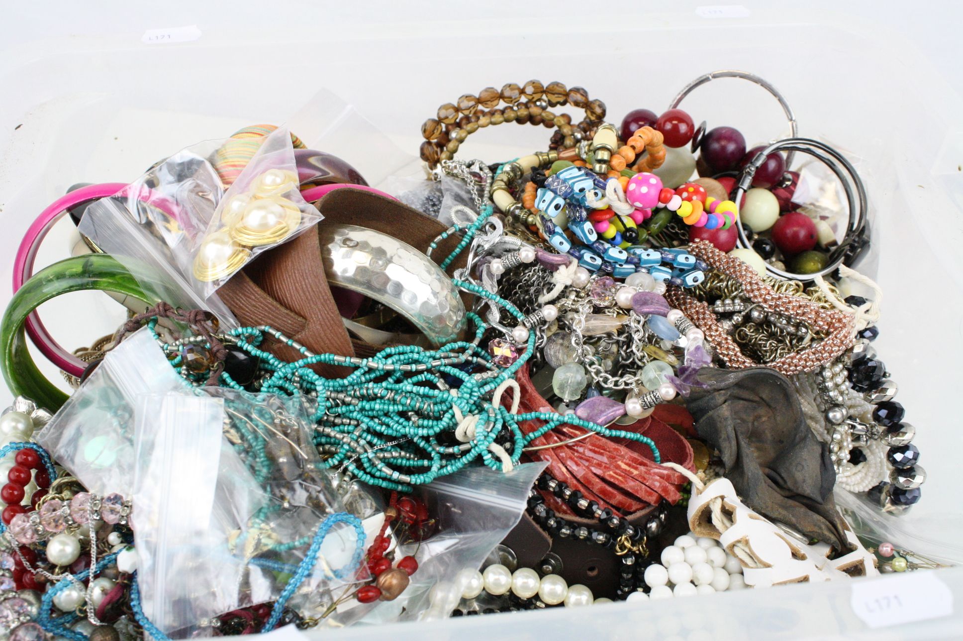 Large quantity of costume jewellery to include necklaces, bangles, beaded jewellery etc