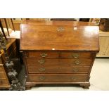 *George III Mahogany Bureau, sloped fall with pull-out supports, the opening to reveal an