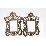 Pair of gilt finished cast iron picture frames by Beatrice with serial number 1009 P and stands