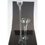 Yard of ale glass funnel and a lily vase