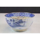 Oriental bowl with gold gilt rim and border in blue & white