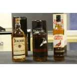 Bottle of Highland Park malt whisky, a boxed bottle of Teachers & similar Famous Grouse whisky (3)