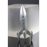 Pewter brooch modelled as a Rocket, maker marked to reverse "SCA"
