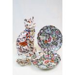 Contemporary Imari patterned seated cat, an oriental cup and saucer & two similar floral patterned