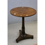 *19th century Mahogany Occasional Table, the circular top above a turned shaft with tripartite