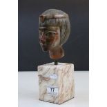 Egyptian carved stone head on stone block stand
