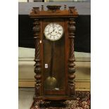 Large early 20th century oak cased Viennese style two train wall clock