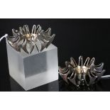 Pair of Silver plated Scandanavian Candle holders designed by Theresa Hvorsleu for "Mema", each