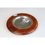 Wooden mounted hallmarked silver Asian dish with pair of raised lions to centre, marked Major PJ