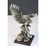 Filled Hallmarked Silver model of an Eagle, approx 25cm tall with wooden base